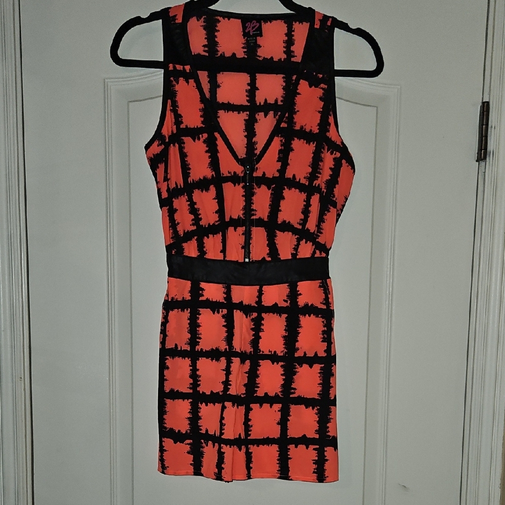 Bebe Black and Pink Zip Up Romper